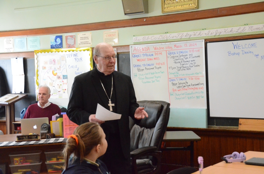 Bishop talking to students 