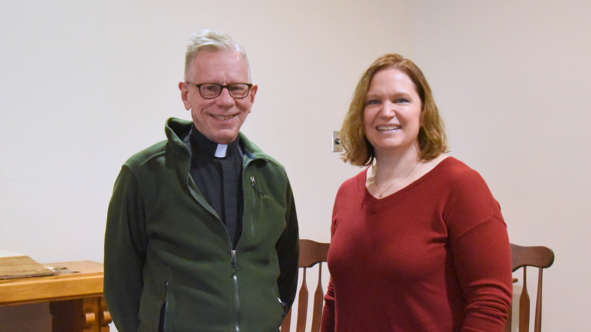 Kim Suttie and Father Dan Baillargeon