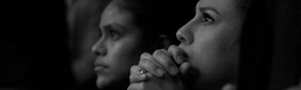 Praying black and white