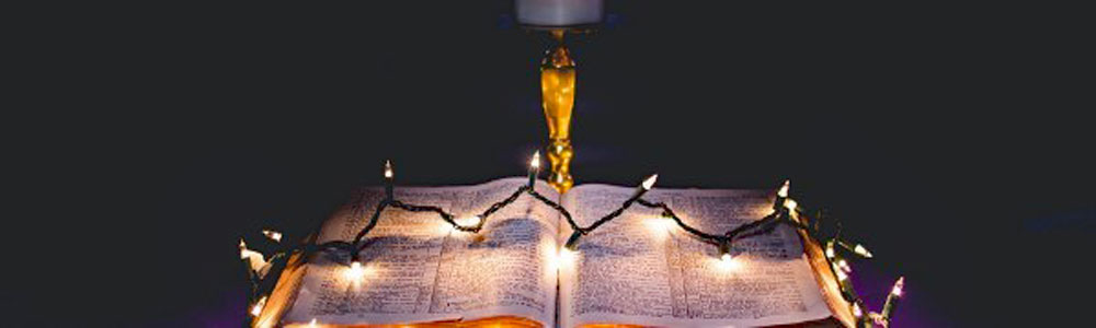 Bible with Christmas lights