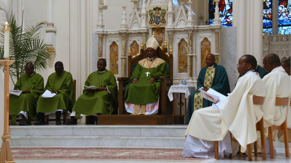 Cardinal Kambanda and accompanying priests from Rwanda