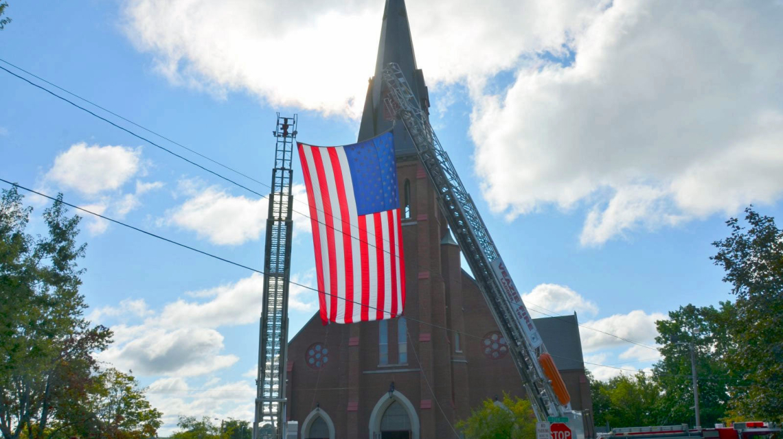 Flag outside St. John Church in Bangor