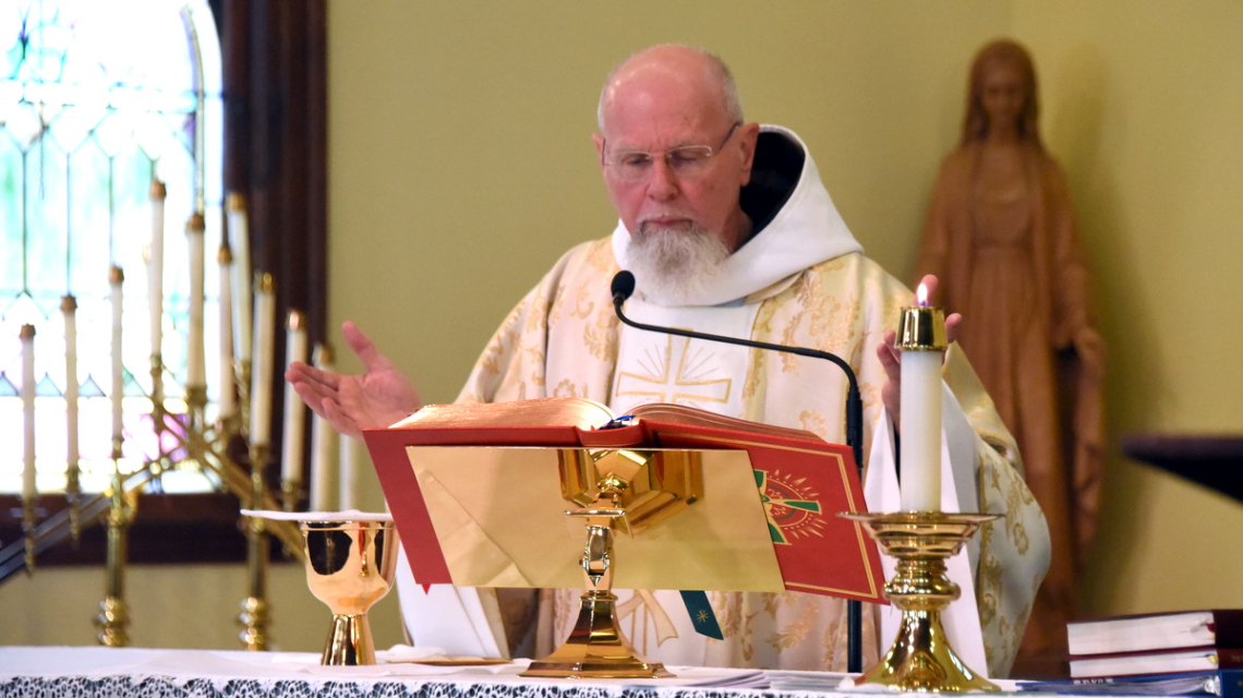 Father Sevigny celebrates Mass.