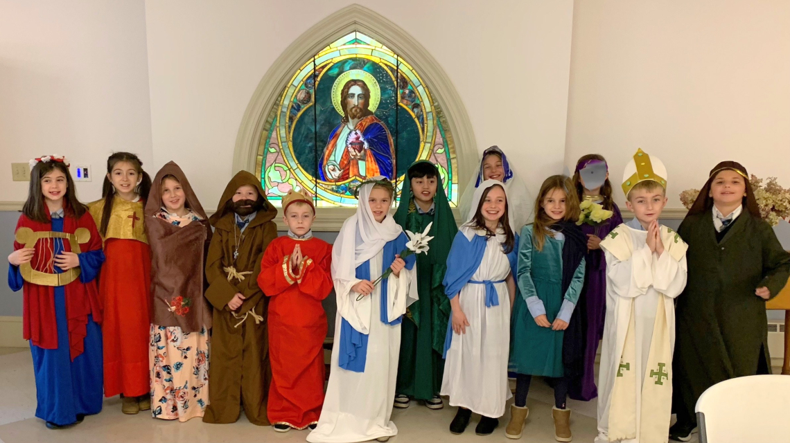 Students dressed as saints