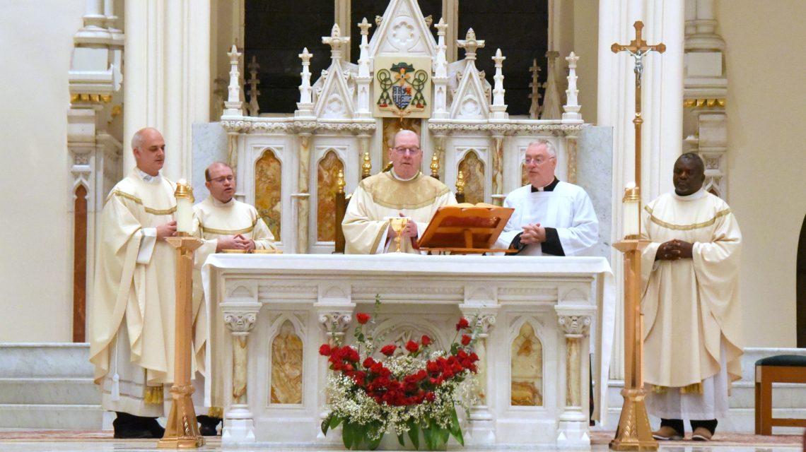 Liturgy of the Eucharist - Bishop Deeley and priests