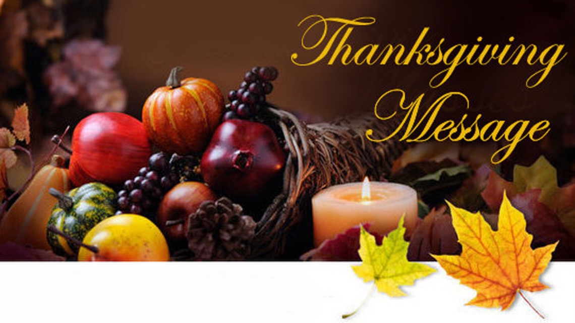 Photography of a cornucopia and candle with the words Thanksgiving Message