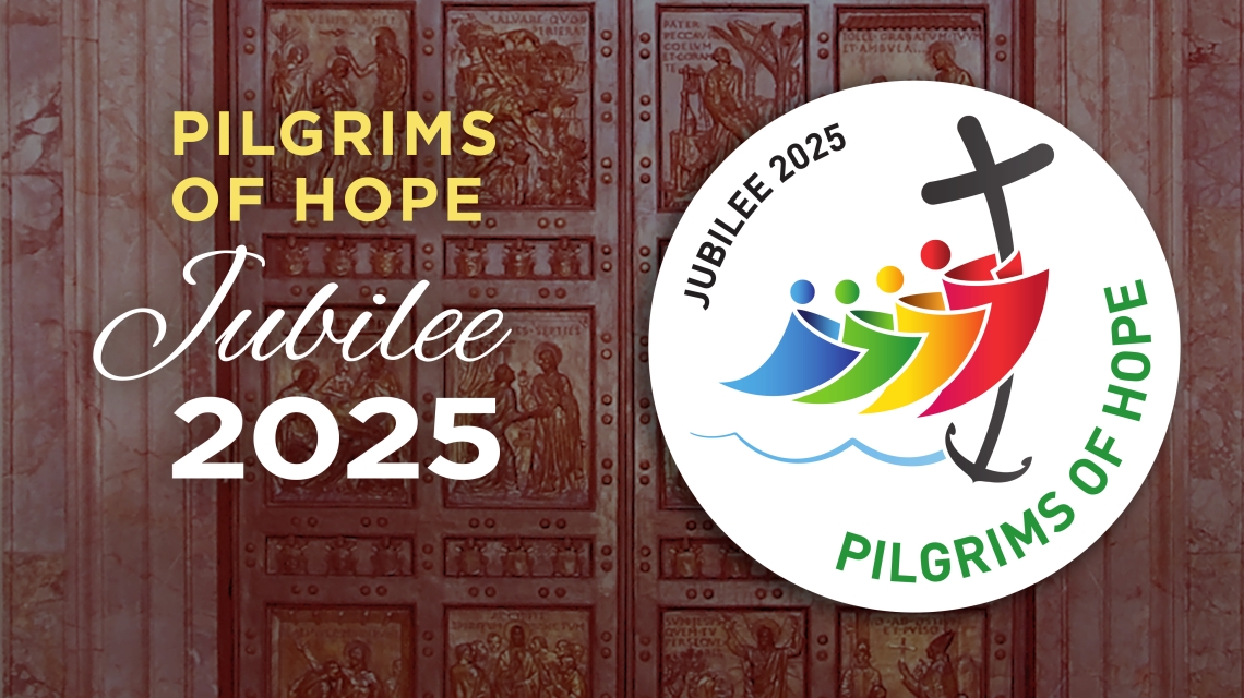 Pilgrims of Hope logo over holy door.