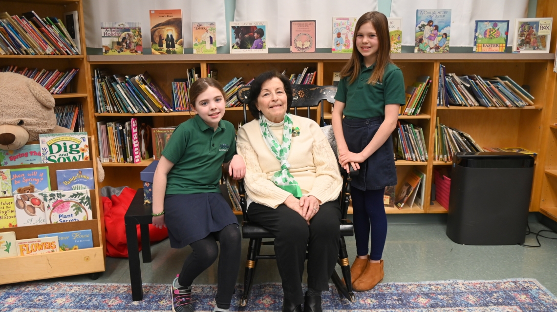 Cecile Beaulieu with two students