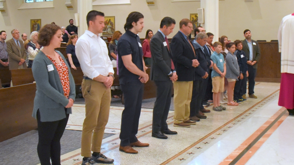 Neophytes standing in a row