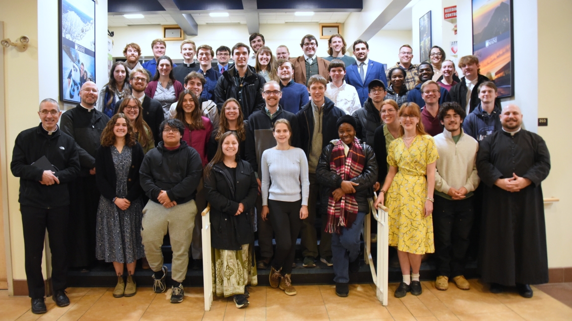 Students with Bishop James Ruggieri and Father Brad Morin