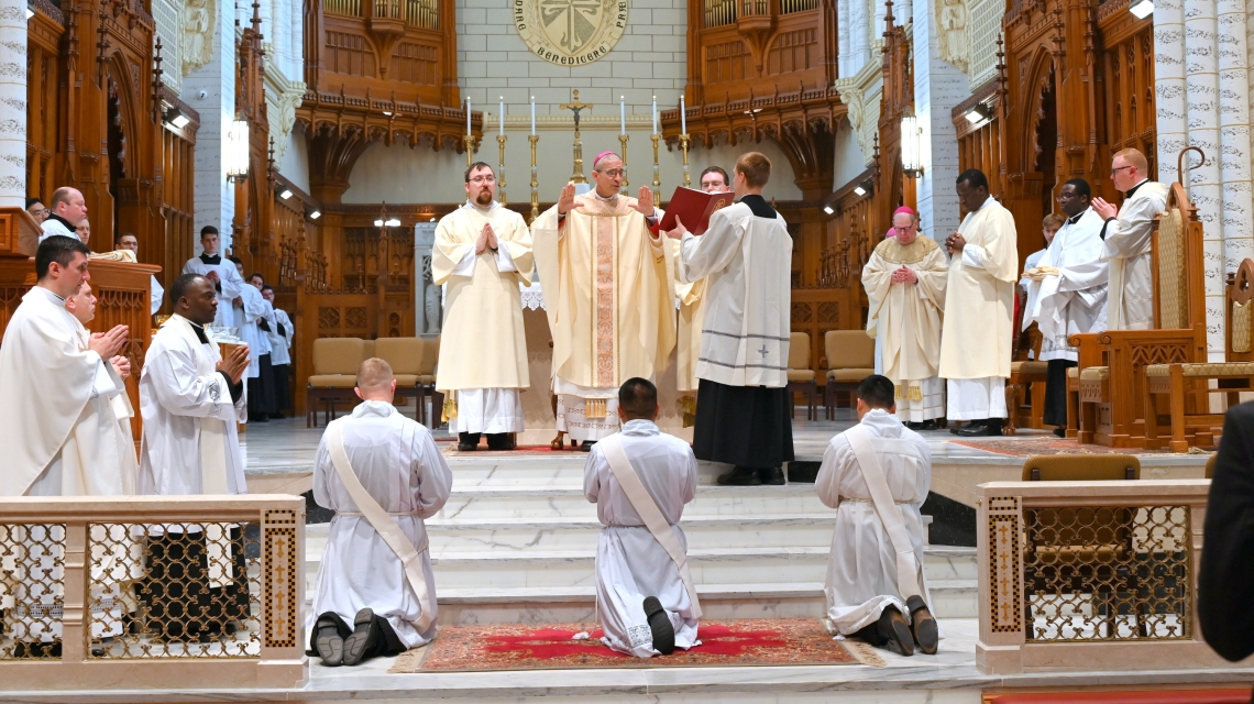 Bishop Ruggieri prays the Prayer of Ordination.