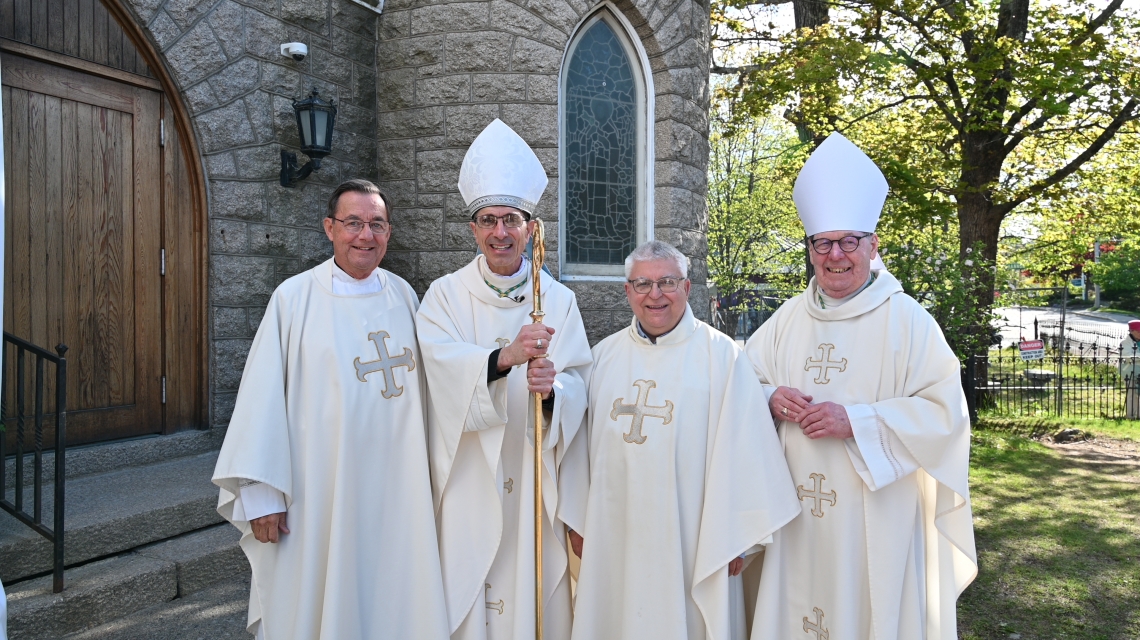 Group of four priests