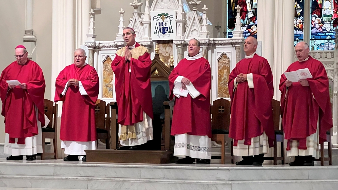Bishop Emeritus Robert Deeley, Deacon Jeffrey Lewis, Bishop James Ruggieri, Deacon Dennis Popadak, Father Seamus Griesbach, and Father Daniel Greenleaf