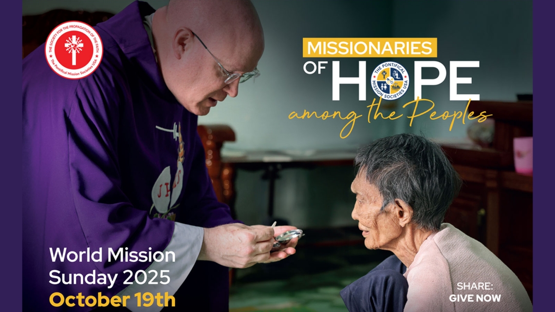 Priest giving Communion to a woman.