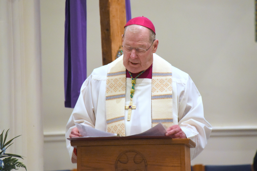 Bishop Deeley prays the Prayer of Consecration