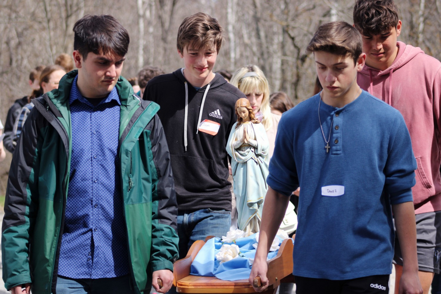 Teens taking part in Marian procession