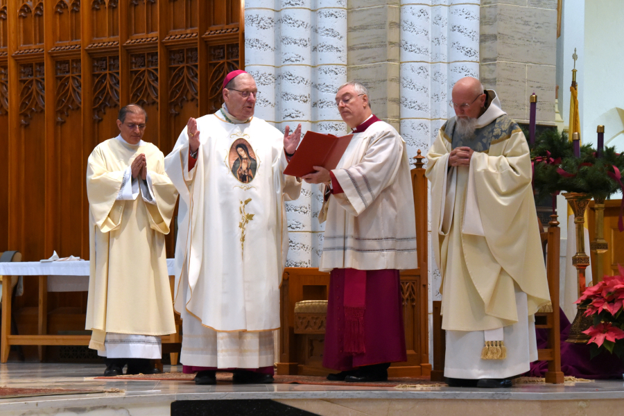 Bishop Deeley with Deacon Arturo Gonzalez, Msgr. Marc Caron, and Father Michael Seavey
