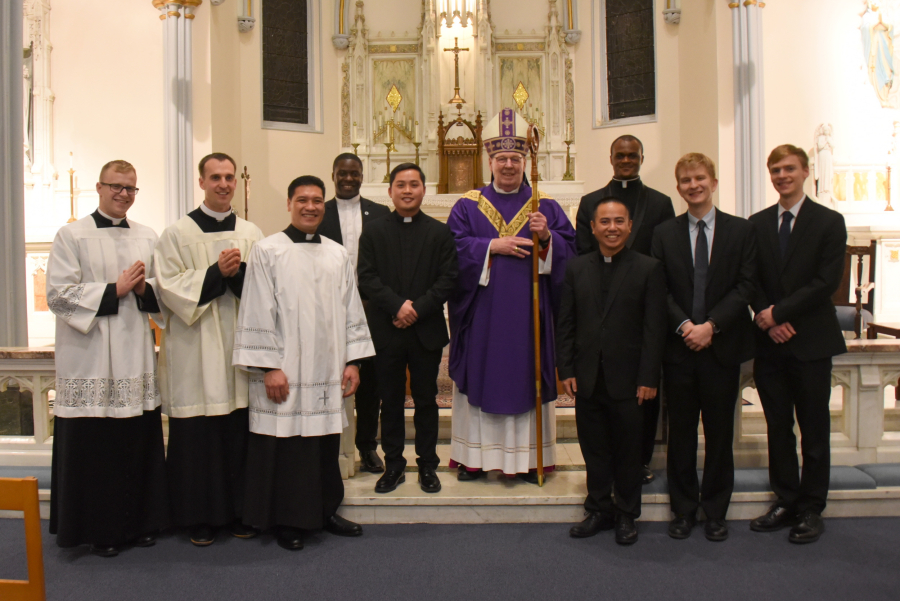 Bishop Robert Deeley and seminarians.