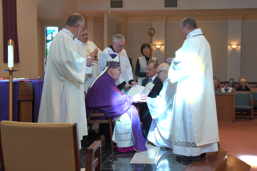 Dan Mahoney vows obedience to the bishop