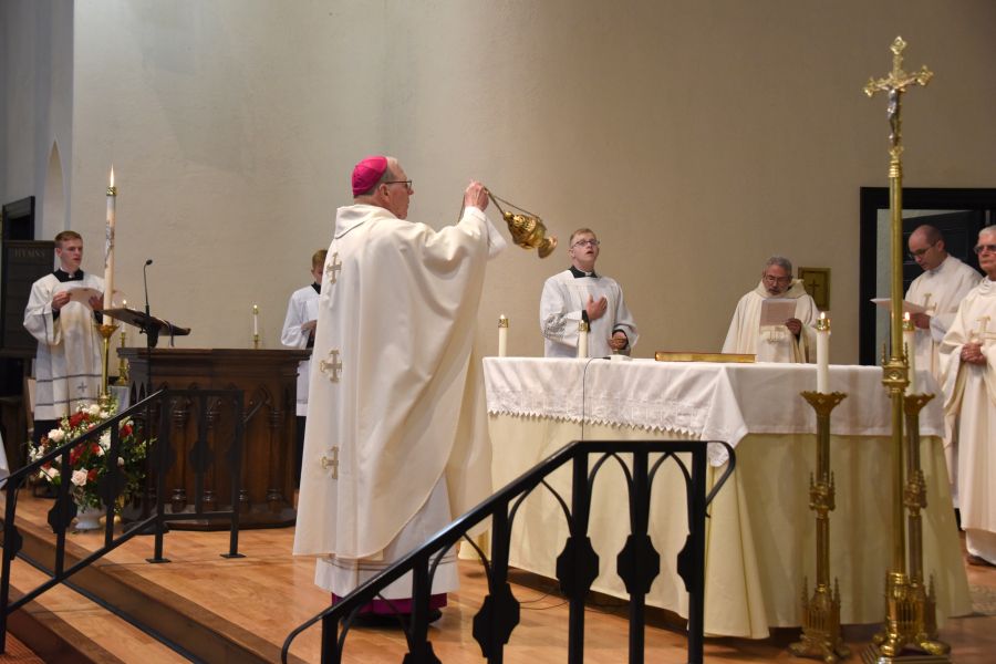 Bishop Robert Deeley incenses the altar