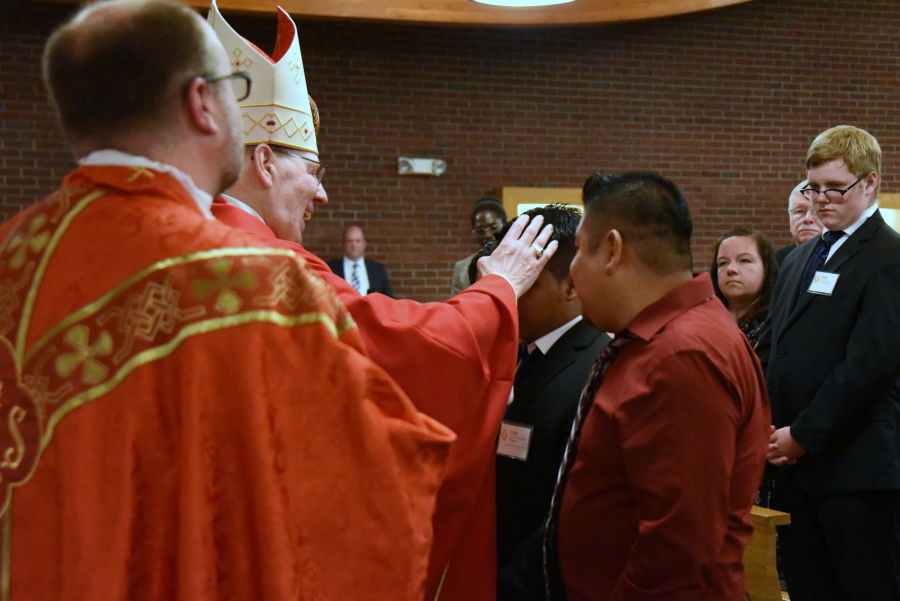 Receiving the sacrament of confirmation