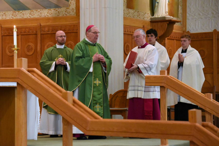 Bishop Deeley delivers the opening prayer.