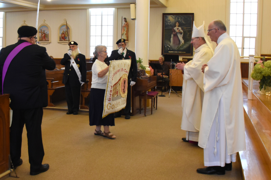 Presentation of a banner to the bishop