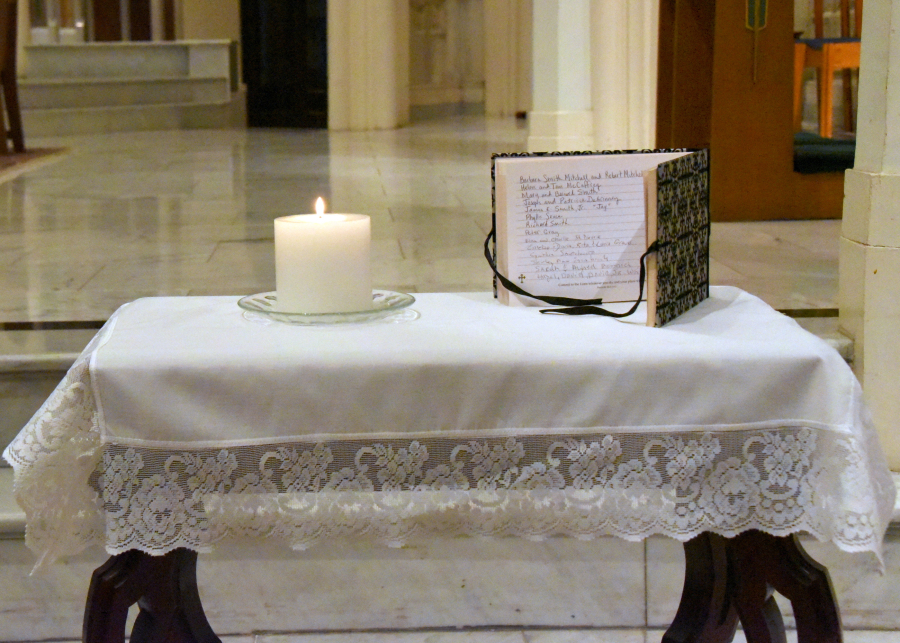 Candle and Book of Remembrance