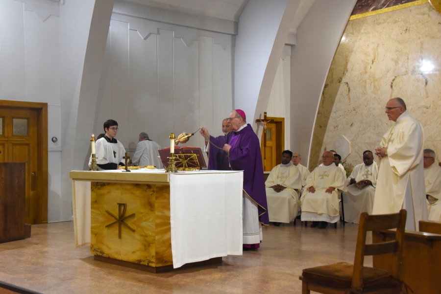 Bishop Deeley incenses the altar.