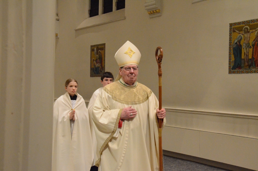 Bishop processes into mass