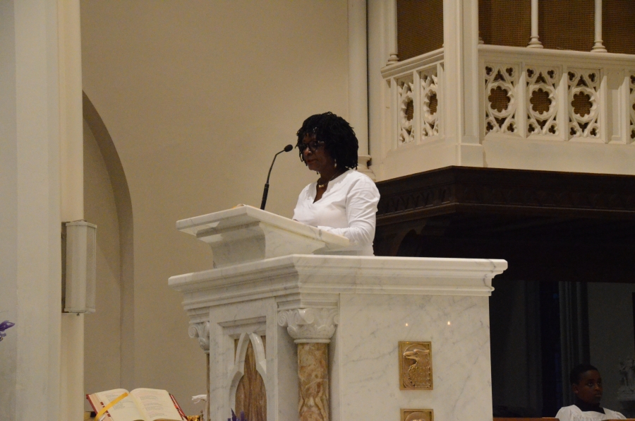Woman speaking from pulpit