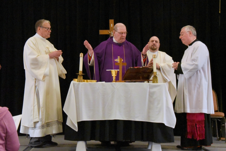 Bishop Robert Deeley celebrating the Liturgy of the Eucharist.