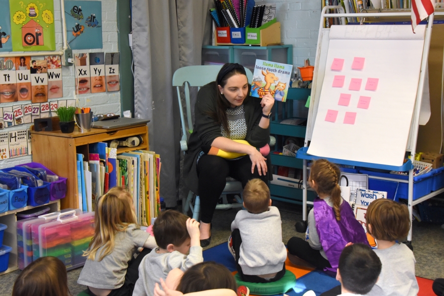Maggie York reading to students.