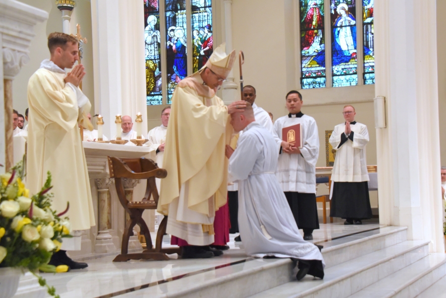 Bishop Ruggieri lays hands on Erin Donlon