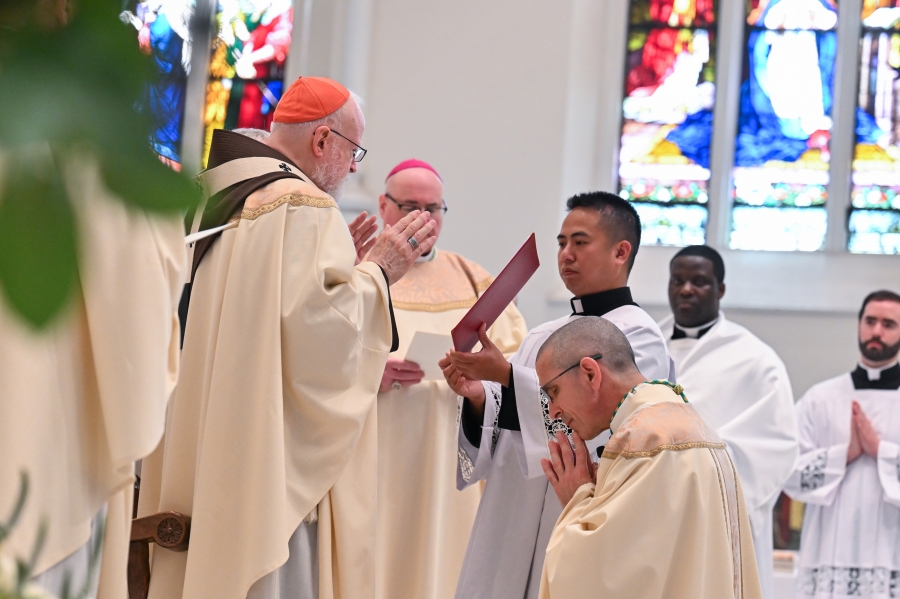 Cardinal O'Malley prays the Prayer of Ordination.