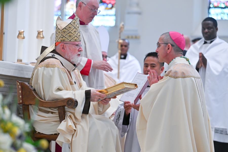 Presentation of the Book of the Gospels by Cardinal O'Malley to Bishop Ruggieri.