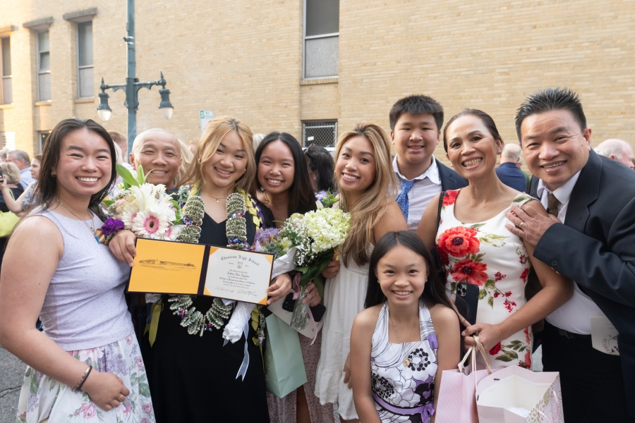 graduate with their family 