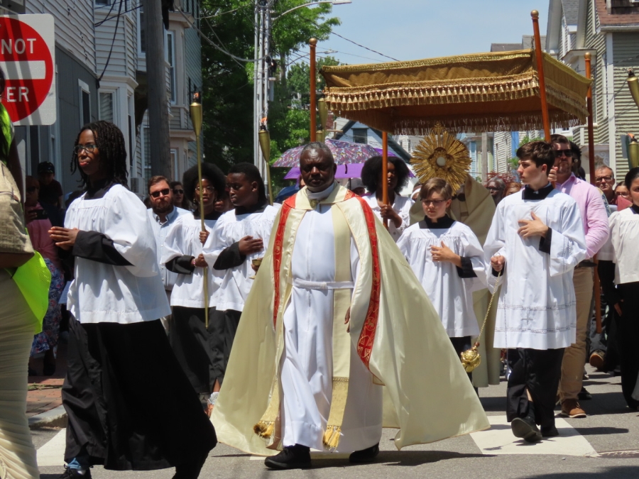people walking in the Feast of Corpus Christi Procession