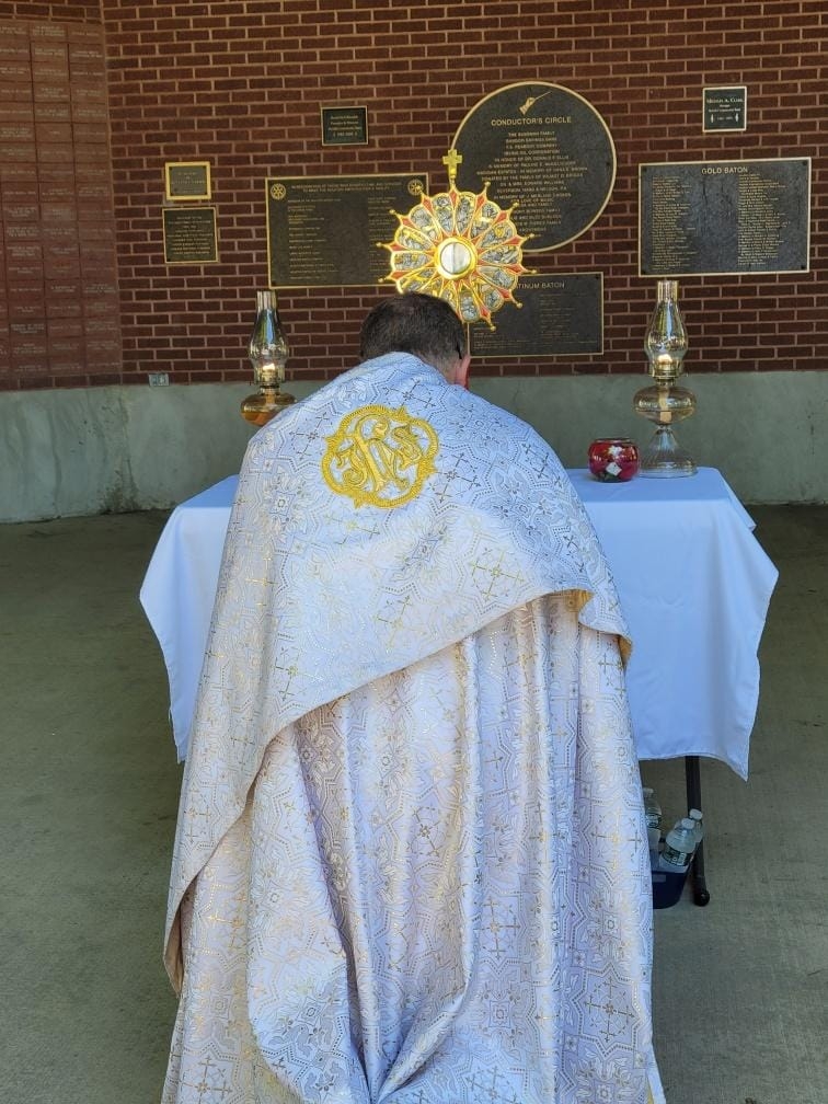 people walking in the Feast of Corpus Christi Procession