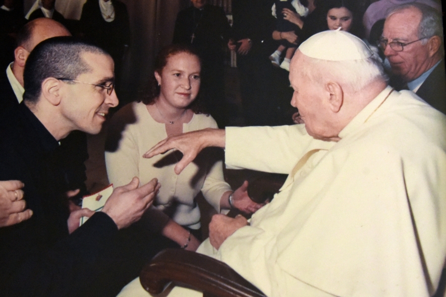 Then-Father James Ruggieri visits with Pope Saint John Paul II.