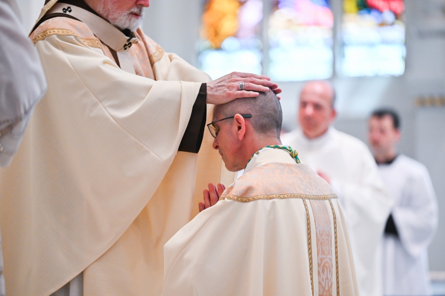 Cardinal O'Malley lays hands on Bishop Ruggieri.