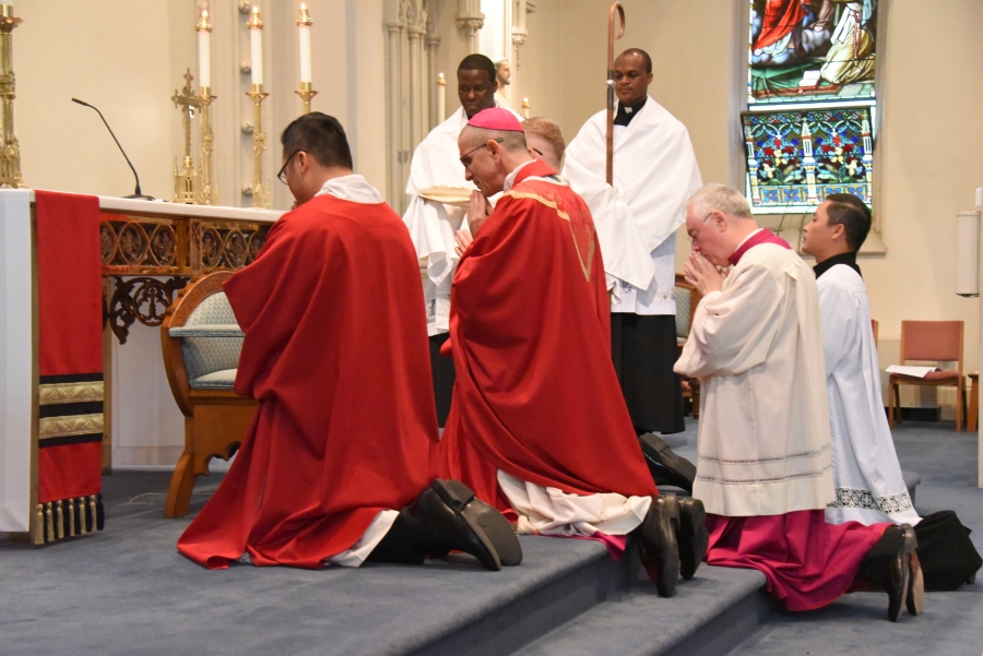 Bishop Ruggieri and others kneel during the Litany of Saints.