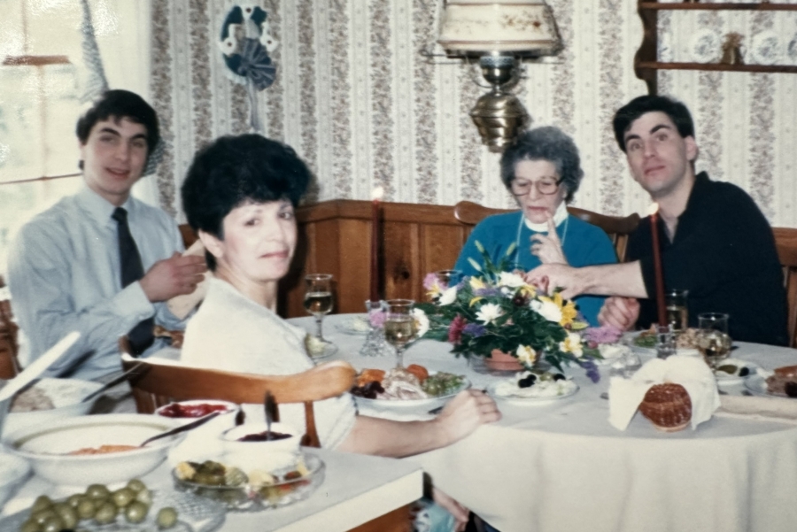 A young James Ruggieri around the dinner table with his family.