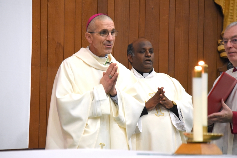 Bishop James Ruggieri with Father Dominic Savio.