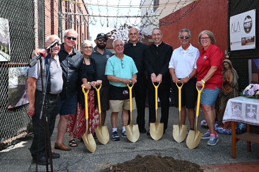 Members of the grotto committee pose with shovesls.