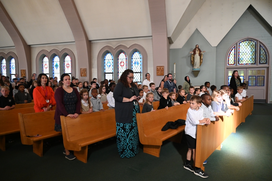 students sitting in church 