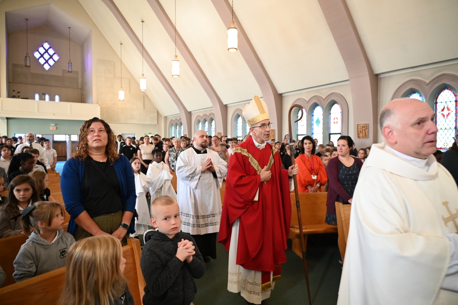 Bishop Ruggieri processing into church 