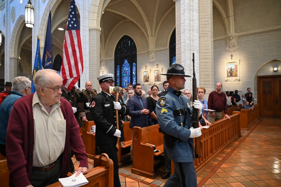 law enforcement bringing flags into the basilica