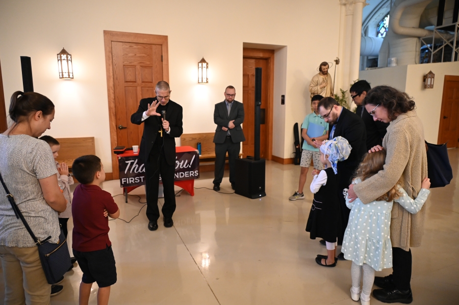 Bishop Ruggieri blessing children 