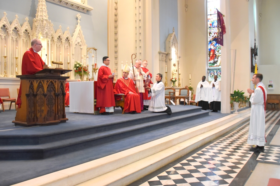 Msgr. Andrew Dubois attests to the readiness of Deacon Matthew Valles.